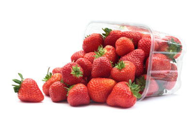 Strawberries in a punnet. Product photography example.